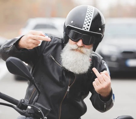 depositphotos_339671208-stock-photo-mature-man-riding-motorcycle-old